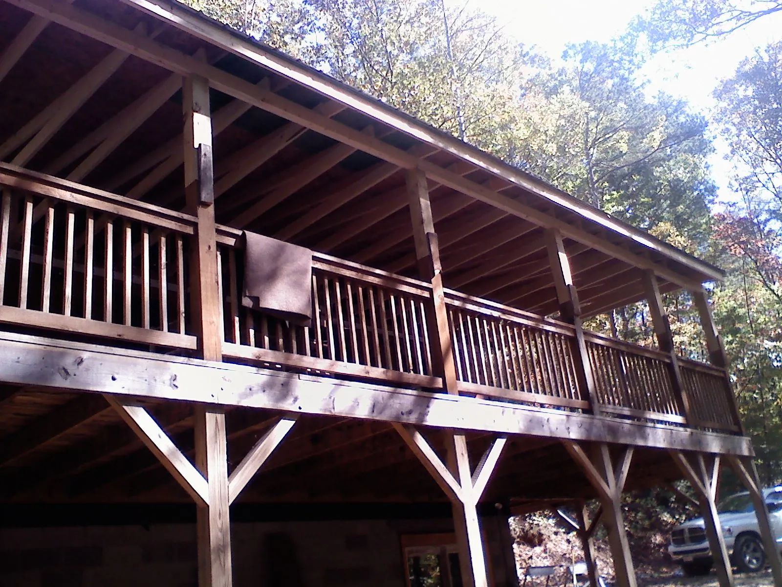 Timber framing under a new elevated porch and deck — Roof Leak Repair in White City by Roofing Brothers